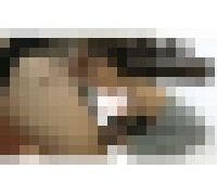 990437