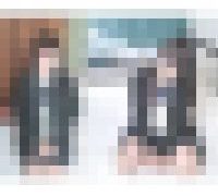 990857